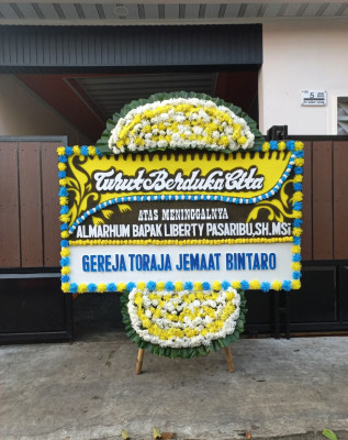 Papan Bunga Duka di Birobuli Utara